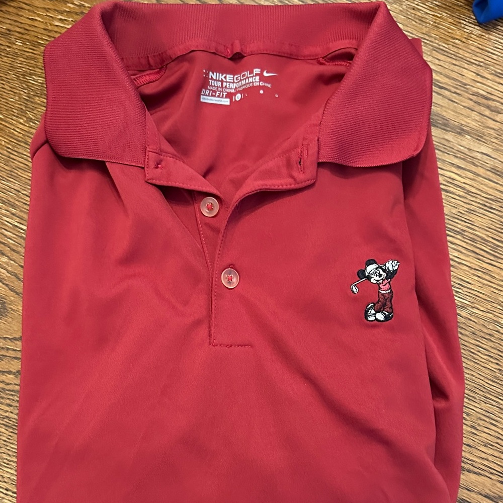 Nike Men Adult Large Polo Shirt in Red with Embroidered Character. No stains